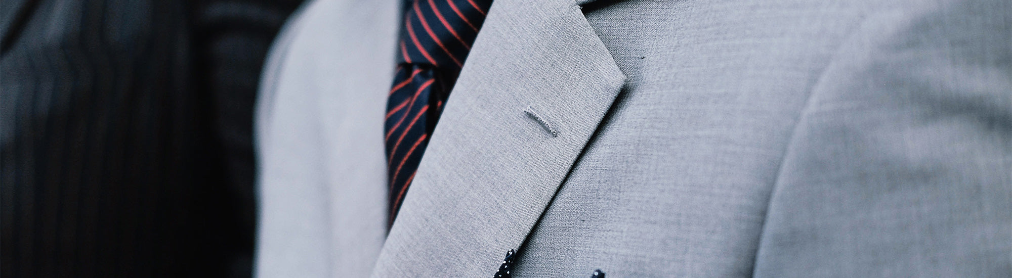 close-up of light grey suit